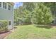 The backyard includes a grassy area with access to the home at 110 Duckwood Ln, Cary, NC 27518