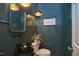 Stylish powder room boasting a unique vessel sink, modern fixtures, and elegant design at 110 Duckwood Ln, Cary, NC 27518