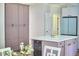 Spacious kitchen with an island, wine fridge, modern appliances and custom cabinets at 110 Duckwood Ln, Cary, NC 27518