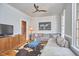 Spacious living room with a large sectional couch, modern furnishings, and natural light at 110 Duckwood Ln, Cary, NC 27518