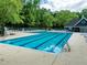 Resort-style community pool with plenty of seating and a kiddie pool, perfect for cooling off on a hot summer day at 110 Duckwood Ln, Cary, NC 27518