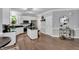 Bright, modern kitchen with white cabinets, stainless steel appliances, and a functional island at 12 Gatesway Ct, Durham, NC 27707
