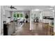 The living room has hardwood floors, a fireplace, and the walls are painted neutral at 12 Gatesway Ct, Durham, NC 27707