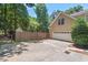 Attached two car garage and fenced yard on this beautiful home at 126 Captains Ct, Durham, NC 27712