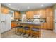 Kitchen with granite countertops and an island with seating at 126 Captains Ct, Durham, NC 27712