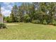 This spacious backyard has a patio and a lush green lawn, perfect for relaxation at 127 Strike Eagle Dr, Broadway, NC 27505
