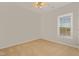 Bedroom with neutral carpet, a ceiling fan, and a bright window at 127 Strike Eagle Dr, Broadway, NC 27505