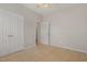 This cozy bedroom features neutral walls, carpet flooring, and ample closet space at 127 Strike Eagle Dr, Broadway, NC 27505