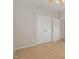 Neutral bedroom with carpet, ceiling fan, closet, and white doors at 127 Strike Eagle Dr, Broadway, NC 27505