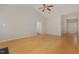 Expansive living room showcases hardwood floors, neutral walls, and smooth transition to other living spaces and front entry at 127 Strike Eagle Dr, Broadway, NC 27505