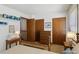 Bright bedroom boasts built in displays, natural light, and hardwood accents at 14 Quintin Pl, Durham, NC 27705