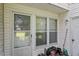 Exterior features white siding, screen doors, and pots for outdoor plants at 14 Quintin Pl, Durham, NC 27705