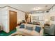 Cozy living room featuring a sofa, a fireplace, dining area and classic decorations at 14 Quintin Pl, Durham, NC 27705
