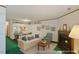 Inviting living room with fireplace, dining area view, and comfortable seating at 14 Quintin Pl, Durham, NC 27705