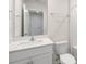 Bright bathroom with single vanity, modern fixtures, toilet and tub/shower combo at 142 Rusling Leaf Dr, Fuquay Varina, NC 27526