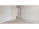 Bedroom with carpet flooring and two doors at 142 Rusling Leaf Dr, Fuquay Varina, NC 27526
