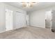 Spacious bedroom with carpet and multiple closets and access to bathroom at 144 Greenmont Ln, Cary, NC 27511