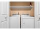 Convenient laundry area with modern appliances and ample storage space at 144 Greenmont Ln, Cary, NC 27511