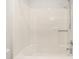 Bathroom showing a fiberglass tub and shower combination with chrome hardware at 144 Greenmont Ln, Cary, NC 27511