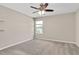 Bedroom with carpet, ceiling fan, and window at 1471 Carlton Links Dr, Fuquay Varina, NC 27526