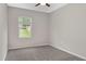 Bedroom with carpet, ceiling fan, and window at 1471 Carlton Links Dr, Fuquay Varina, NC 27526