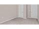 Bedroom with carpet and two doors at 1471 Carlton Links Dr, Fuquay Varina, NC 27526