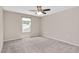 Bedroom with carpet, ceiling fan, and window at 1471 Carlton Links Dr, Fuquay Varina, NC 27526