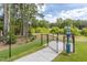 Well-equipped community dog park with secure fencing, waste station, and ample space at 1471 Carlton Links Dr, Fuquay Varina, NC 27526