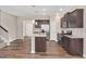 Well-equipped kitchen with granite countertops, stainless steel appliances, and an island at 1471 Carlton Links Dr, Fuquay Varina, NC 27526