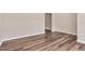 Neutral living room showcasing wood-look floors and modern paint at 1471 Carlton Links Dr, Fuquay Varina, NC 27526