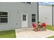Outdoor patio featuring wooden chairs with red cushions at 1471 Carlton Links Dr, Fuquay Varina, NC 27526