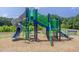 Community playground featuring colorful slides, ladders, and play structures for children at 1471 Carlton Links Dr, Fuquay Varina, NC 27526
