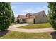Beautiful home with a two-car garage, well-kept lawn, and inviting front entry at 1523 Anthology Dr, Durham, NC 27703