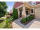 Inviting front porch featuring stone accents, a walkway, and manicured landscaping at 1523 Anthology Dr, Durham, NC 27703