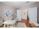 Well-lit home office showcases hardwood floors and a calming color palette at 1523 Anthology Dr, Durham, NC 27703