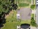 Aerial view of a home with a large backyard, patio, and well-maintained lawn at 175 Hawkesburg Dr, Clayton, NC 27527
