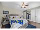 Bedroom with hardwood floors, neutral paint, and ceiling fan at 175 Hawkesburg Dr, Clayton, NC 27527