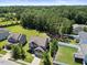 Beautiful home featuring a well-maintained lawn and mature trees enhancing its curb appeal at 175 Hawkesburg Dr, Clayton, NC 27527