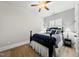 Bedroom with a ceiling fan, a bed, and window blinds at 175 Stonecrest Way, Pittsboro, NC 27312