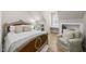 Bedroom featuring a reading nook with built-in bookshelves and a comfortable armchair at 175 Stonecrest Way, Pittsboro, NC 27312