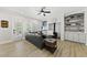 Bright living room features a fireplace, built-in shelves, and outdoor access at 175 Stonecrest Way, Pittsboro, NC 27312