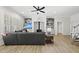 Bright living room features a fireplace, built-in shelves, and comfortable seating at 175 Stonecrest Way, Pittsboro, NC 27312