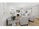 Bright living room with fireplace, built-in shelving, and comfortable seating at 175 Stonecrest Way, Pittsboro, NC 27312