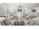 Inviting living room with fireplace, built-in shelving, and plenty of natural light at 175 Stonecrest Way, Pittsboro, NC 27312