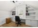 Well-lit office features built-in bookshelves, a desk, and an arched window at 175 Stonecrest Way, Pittsboro, NC 27312
