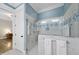Shower with designer tile, glass enclosure, and modern fixtures in a light blue bathroom at 175 Stonecrest Way, Pittsboro, NC 27312