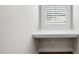 Bright window nook features a built-in desk and shuttered window at 175 Stonecrest Way, Pittsboro, NC 27312