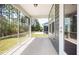 Screened porch with view of the lawn, open to the outside at 1812 Gazania Dr, Fuquay Varina, NC 27526