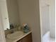 Clean bathroom features a functional sink, vanity, and shower-tub combination at 1819 Collier Rd, Durham, NC 27707