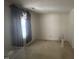 Comfortable bedroom with a window, carpeted floors, and neutral-colored walls at 1819 Collier Rd, Durham, NC 27707